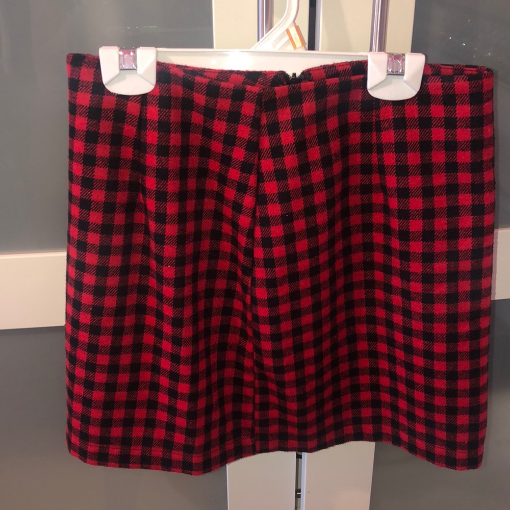Red and black checkered skirt